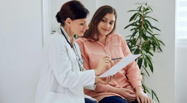 Doctor explaining treatment to women